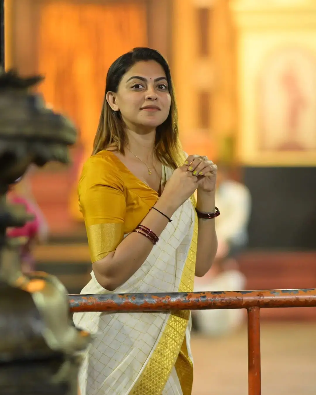 Anusree Nair Wearing Beautiful Earrings Jewellery White Saree Yellow Blouse